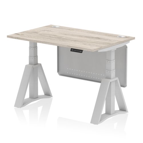 Air Modesty 1200 x 800mm Height Adjustable Office Desk Grey Oak Top Cable Ports Silver Leg With Silver Steel Modesty Panel with Piste Foot