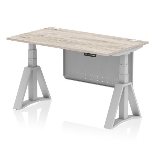 Air Modesty 1400 x 800mm Height Adjustable Office Desk Grey Oak Top Cable Ports Silver Leg With Silver Steel Modesty Panel with Piste Foot