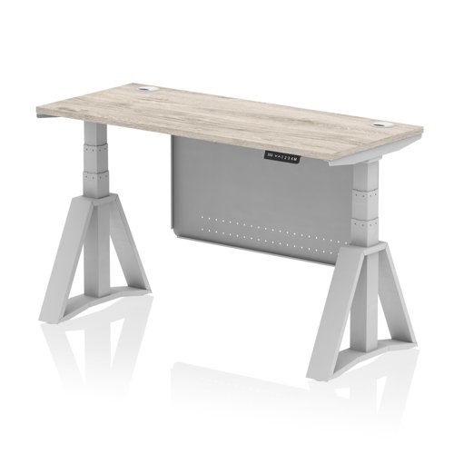 Air Modesty 1400 x 600mm Height Adjustable Office Desk Grey Oak Top Cable Ports Silver Leg With Silver Steel Modesty Panel with Piste Foot
