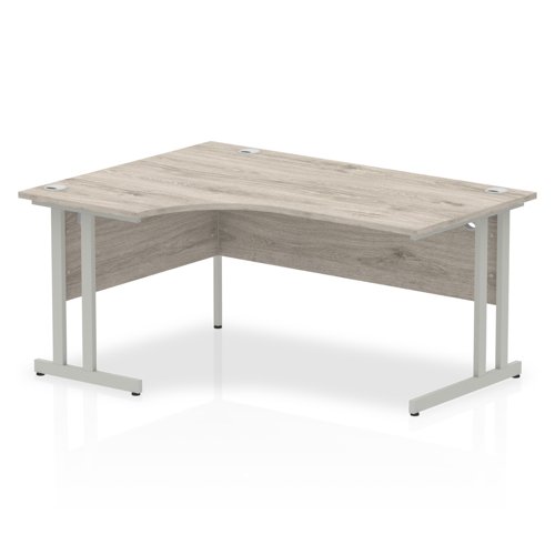 Impulse 1600mm Left Crescent Office Desk Grey Oak Top Silver Cantilever Leg