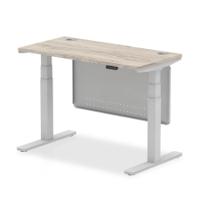Air Modesty 1200 x 600mm Height Adjustable Office Desk Grey Oak Top Cable Ports Silver Leg With Silver Steel Modesty Panel