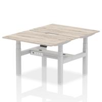 Air Back-to-Back 1200 x 800mm Height Adjustable 2 Person Office Bench Desk Grey Oak Top with Scalloped Edge Silver Frame