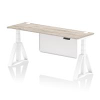Air Modesty 1800 x 600mm Height Adjustable Office Desk Grey Oak Top Cable Ports White Leg With White Steel Modesty Panel with Piste Foot