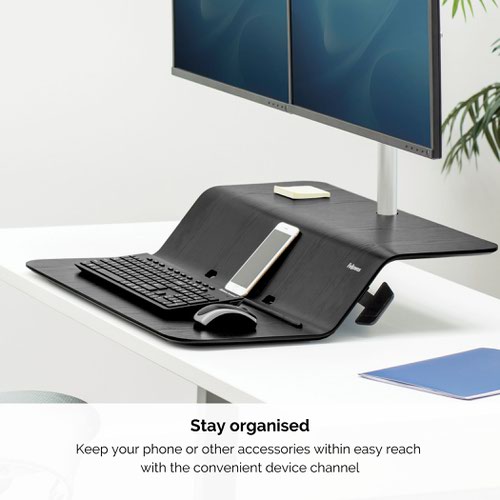 The Fellowes Lotus RT Sit/Stand Workstation Dual Screen easily transitions from sitting to standing with Smooth Lift Technology. There is a spot for all of your essentials on the dual work surfaces with device viewing channel. Keep your space tidy with comprehensive cord management. Mount to the back edge of any work surface with the single clamp design. Includes a dual monitor arm to keep your screens secure. Stable at every height, it has a work surface for your screen and essentials to sit flush against your desk or to raise your equipment for standing use.