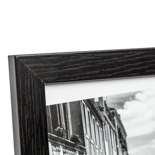 With its black wooden frame adding a touch of class, this A4 certificate frame has a clear glass front and is ideal for displaying certificates and photographs. Free standing or suitable for wall hanging, it can be displayed either portrait or landscape.