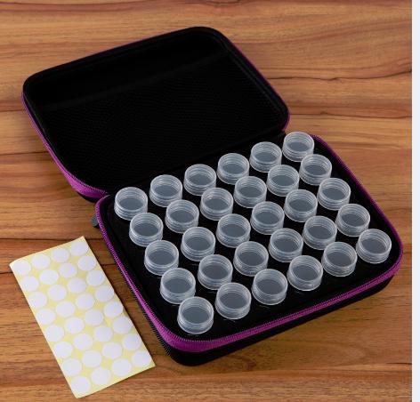 10173CB | This smart and sturdy Crystal Art Kit case comes with 30 acrylic bottles and labels as well as a handy interior pocket. The handle and double zip design makes it the perfect portable solution to store and carry all your crystals. 