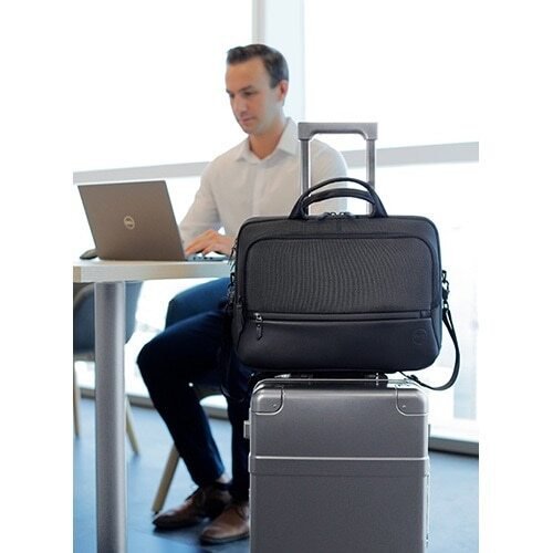 8DEPEBC1520 | Designed to allow you to move quickly through TSA security checkpoints without removing your laptop, choose the Dell EcoLoop Premier Briefcase 15 (PE1520C) as your ultimate travel companion. Made with Dell’s EcoLoop solution dyeing process for polyester that generates up to 90% less wastewater, 62% less CO2 emissions, and uses up to 29% less energy than traditional dyeing processes, it’s kind to our environment too.Your laptop and important documents will remain dry in wet, stormy weather while inside the briefcase that is constructed of sturdy polyester with luxurious black leather accents, and coated with a water-resistant, protective material made from reclaimed automobile windshields.EVA foam cushioning with an anti-scratch lining offers shock resistance and a lightweight way to protect your laptop wherever your travels take you.When you’re taking off on your next business trip, carry the lightweight briefcase by the leather cushioned top handles and be on your way. Or, sling the detachable and adjustable, non-slip padded strap over your shoulder to go hands-free. When you’re traveling with a rolling suitcase, simply attach the briefcase on top of the case with the trolley strap and head to your next flight, bus or train.Charge your laptop inside the briefcase while you’re traveling by passing a cable through to a dedicated portable charger pocket. You’ll arrive at your destination ready to continue working on your charged laptop.Keep your important documents and business supplies well organized in the briefcase’s main storage compartment. Place keys, coins and other small essentials in the zippered organizer compartment and tuck your passport or smartphone within the discreet valuables back panel pocket while you’re traveling.