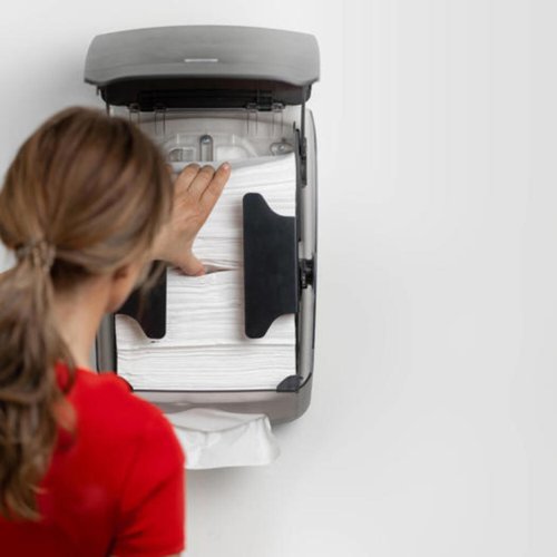 KZ07741 | This Katrin Folded Hand Towel M Dispenser offers an easy way to ensure the work area remains hygienic and light, effortless dispensing. Featuring an upwards opening and supporting ribs which hold the towels in place when carrying out refills. Access to refill the dispenser via the lock can be operated with or without a key. Resistant to high temperatures, the dispenser is compliant with UL94 Fire Safety and Fire Protection regulations (EU). Supplied in white.