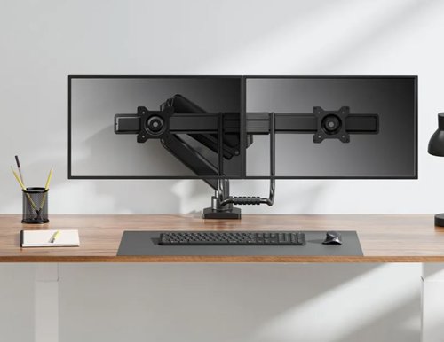 NEO44947 | This desk mountwith full motion for two flat screens up to 32 inches with a maximum weight capacity of 8kg per screen. The versatile tilt (20), rotate (360) and swivel (20) technology allows the mount to change to any viewing angle to fully benefit from the capabilities of the screens. Additionally, the mount has gas spring height adjustment (277-560mm) and depth adjustment (0-5055mm), to create the perfect working position. Features the nifty 180 stop mechanism, that allows you to safely adjust the mount even when it's placed close to a wall or separation panel without making contact with the wall. The smart cable management system ensures orderly routing of the cables. Suitable for screens that meet VESA hole pattern 75x75 or 100x100 mm. Unused hole patterns can be covered using one of Neomounts 's VESA adapter plates. The desk mount is equipped with an Quick-release VESA system and comes with both a topfix clamp and grommet for quick and easy installation. The inner packaging s plastic free and made from cardboard and paper.