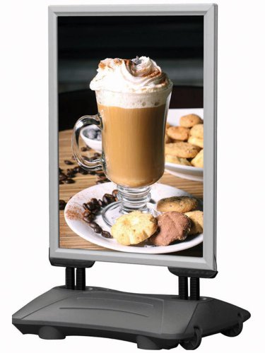 The Wind Pro snap frame forecourt sign has thick PVC covers and a large snap frame extrusion for strong poster hold.Safety corners are built into the frame and  4 large springs provide movement of the main panel.The sign has a large waterfill base for stability and in-built wheels for easy movement.Waterproof for outdoor use.Display size is 20 x 30 inches.