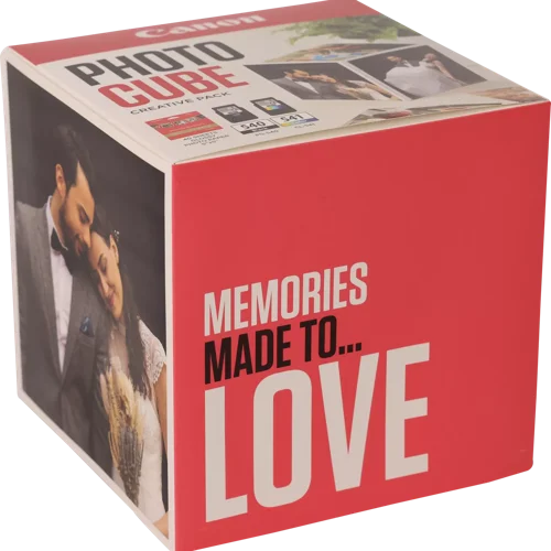 CAN5225B016 | The Photo Cube is a great way to store and display your favourite photos. Small enough to place around your home, you can store your most precious photos inside the box, display the photos on the outside of your box or gift the box to family and friends. You can also use the supplied double-sided tape to decorate the box. The box measures 14 x 14 x 14 cm (approximate), which allows for plenty of space for printed images. The square format is great for social media format printing, making this a great choice for family and friends. This pack is supplied with Genuine Canon PG-540 Black Ink Cartridges, CL-541 C/M/Y Colour Ink Cartridges and 40 5x5” (13 x 13 cm) sheets of square Photo Paper Plus Glossy II, allowing you to get more creative with your printing.
