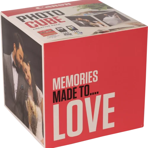 CAN3713C011 | The Photo Cube is a great way to store and display your favourite photos. Small enough to place around your home, you can store your most precious photos inside the box, display the photos on the outside of your box or gift the box to family and friends. You can also use the supplied double-sided tape to decorate the box. The box measures 14 x 14 x 14 cm (approximate), which allows for plenty of space for printed images. The square format is great for social media format printing, making this a great choice for family and friends. This pack is supplied with Genuine Canon PG-560 Black Ink Cartridges, CL-561 C/M/Y Colour Ink Cartridges and 40 5x5” (13 x 13 cm) sheets of square Photo Paper Plus Glossy II, allowing you to get more creative with your printing.