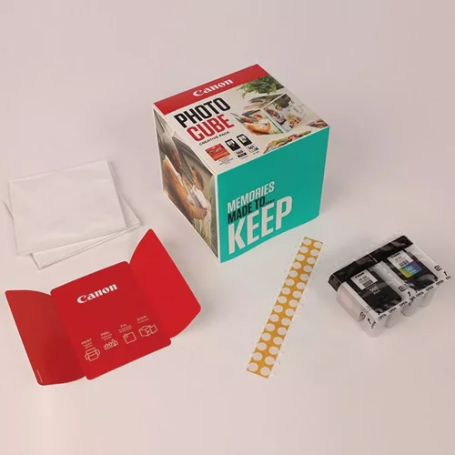 CAN3713C012 | The Photo Cube is a great way to store and display your favourite photos. Small enough to place around your home, you can store your most precious photos inside the box, display the photos on the outside of your box or gift the box to family and friends. You can also use the supplied double-sided tape to decorate the box. The box measures 14 x 14 x 14 cm (approximate), which allows for plenty of space for printed images. The square format is great for social media format printing, making this a great choice for family and friends. This pack is supplied with Genuine Canon PG-560 Black Ink Cartridges, CL-561 C/M/Y Colour Ink Cartridges and 40 5x5” (13 x 13 cm) sheets of square Photo Paper Plus Glossy II, allowing you to get more creative with your printing.