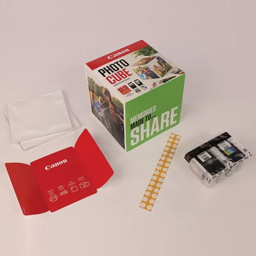 CAN3713C014 | The Photo Cube is a great way to store and display your favourite photos. Small enough to place around your home, you can store your most precious photos inside the box, display the photos on the outside of your box or gift the box to family and friends. You can also use the supplied double-sided tape to decorate the box. The box measures 14 x 14 x 14 cm (approximate), which allows for plenty of space for printed images. The square format is great for social media format printing, making this a great choice for family and friends. This pack is supplied with Genuine Canon PG-560 Black Ink Cartridges, CL-561 C/M/Y Colour Ink Cartridges and 40 5x5” (13 x 13 cm) sheets of square Photo Paper Plus Glossy II, allowing you to get more creative with your printing.