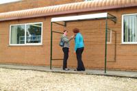 Wall Mounted Smoking Shelter c/w 1 x Side Panel; Triple Wall Polycarbonate & Galvanised Roof; Green