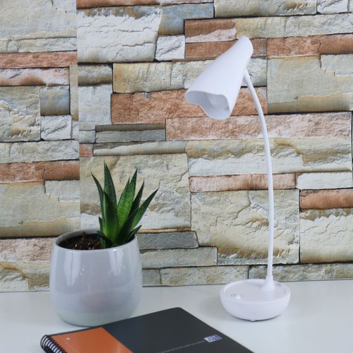 The Unilux Ukky LED Desk Lamp in white is portable due to its wireless feature and low weight of 190g, making it easily transportable from one workspace to another. Suitable for direct connection to a USB port with a 1m cord (supplied) or via x3 AA batteries (not supplied). With an fully flexible arm to enable adjustable lighting, the lamp also features light intensity variation offering stable light quality without flicker or glare. Complete with a 2 year guarantee.