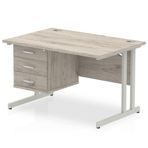 Impulse 1200 x 800mm Straight Office Desk Grey Oak Top Silver Cant Leg Workstation 1 x 3 Draw Fixed