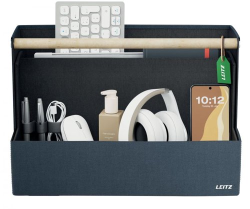 36133J | Make yourself at home wherever your day takes you with the Fabric Storage Range from Leitz. Featuring a minimalist design and an inviting matte grey velvet finish, this collection allows you to stay stylish while staying organised—whether at the office, at home, working hybrid, or anywhere in between. The Leitz Fabric Portable Desk Organiser with Handle boasts four separate compartments, providing ample space to store everything you need for the day ahead. Work from anywhere with this modern, practical, and stylish desk tidy box, which has enough room for a 15" laptop, a compact keyboard, a mouse, a charging cable, a headset, a notebook, and a water bottle. The sleek wooden handle makes it easy and comfortable to move from one desk to another.When the day is done, your portable office caddy, measuring 38 x 19 x 26 cm, can be easily stored in a cabinet, locker, or on a shelf to free up valuable space. This compact desk storage solution isn't just for hot desking; it's also ideal for organising your arts and crafts or other hobby essentials, with a maximum weight limit of 8 kg.Made from soft materials to protect your equipment from scratches, it is also reinforced with recycled cardboard for added strength and durability. Overall, it contains 52% recycled content.Understanding that space can be limited, this desk tidy box can be collapsed for easy storage when not in use. It’s the perfect addition for home, office, or school, helping you stay organised, productive, stress-free, and feeling good at work and beyond.