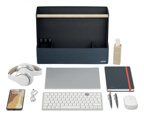 36133J | Make yourself at home wherever your day takes you with the Fabric Storage Range from Leitz. Featuring a minimalist design and an inviting matte grey velvet finish, this collection allows you to stay stylish while staying organised—whether at the office, at home, working hybrid, or anywhere in between. The Leitz Fabric Portable Desk Organiser with Handle boasts four separate compartments, providing ample space to store everything you need for the day ahead. Work from anywhere with this modern, practical, and stylish desk tidy box, which has enough room for a 15" laptop, a compact keyboard, a mouse, a charging cable, a headset, a notebook, and a water bottle. The sleek wooden handle makes it easy and comfortable to move from one desk to another.When the day is done, your portable office caddy, measuring 38 x 19 x 26 cm, can be easily stored in a cabinet, locker, or on a shelf to free up valuable space. This compact desk storage solution isn't just for hot desking; it's also ideal for organising your arts and crafts or other hobby essentials, with a maximum weight limit of 8 kg.Made from soft materials to protect your equipment from scratches, it is also reinforced with recycled cardboard for added strength and durability. Overall, it contains 52% recycled content.Understanding that space can be limited, this desk tidy box can be collapsed for easy storage when not in use. It’s the perfect addition for home, office, or school, helping you stay organised, productive, stress-free, and feeling good at work and beyond.