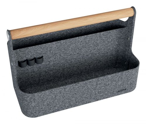 36134J | Our premium Leitz Portable Desk Organiser with Handle makes hot desking easier than ever. As you move from desk to desk, keep your essentials close and your workspace clutter-free with this stylish storage solution.Designed for hot desking and flexible workspaces, this desk tidy features two spacious compartments for storing your office essentials, such as your laptop, compact keyboard, water bottle, notebook, or mobile phone. Additionally, it includes three elastic holders for pens and cables, ensuring everything stays neatly organised and easily accessible. As they say, a tidy desk leads to a tidy mind.This portable office caddy is thoughtfully crafted from durable material made from 100% recycled post-consumer thermo felt and is delivered in plastic-free packaging. Plus, it looks great! The wooden handle adds a natural aesthetic and makes it easy and comfortable to transport. Its minimalist design, combined with an inviting grey velvet finish, keeps you stylish while staying organised on the move.Whether you're in the office, at home, or working in a hybrid setup, this compact desk storage solution is here to make your 9-to-5 easier. Beyond work, it’s also ideal for storing your art and craft supplies or other hobby essentials, with a maximum weight limit of 7.5 kg.Once your workday is done, the Leitz Portable Desk Organiser can easily be stored in a cabinet, locker, or on a shelf, thanks to its dimensions of 38 x 19 x 25.5 cm, freeing up valuable space.Blending home comfort with practical, smart design, our Leitz Portable Desk Organiser with Handle is the perfect addition for your home, office, or school. Stay organised, productive, and stress-free while feeling great at work and beyond.