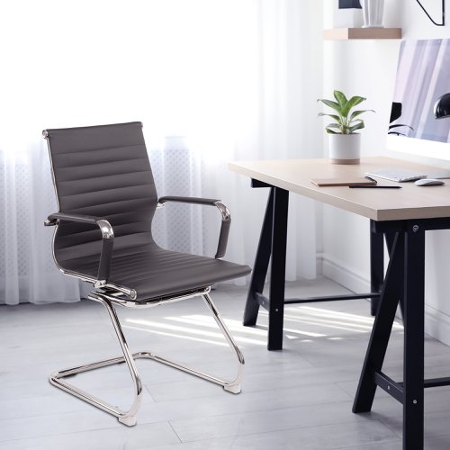 41537NA | This medium back contemporary classic designer cantilever armchair offers detailed stitching design, a strong single piece chrome frame with rolled top and seat base upholstered in plush bonded leather with complementing integral chrome arms and matching bonded leather sleeves, and is suitable for both a workplace or home office environment.