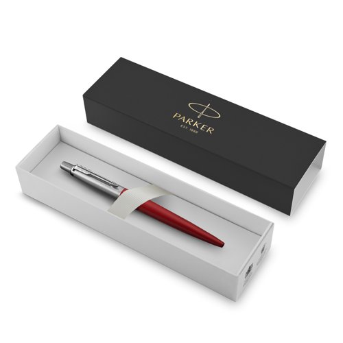 Slow down and appreciate the experience of expressing your thoughts and ideas on paper with the PARKER Jotter Kensington Red ballpoint pen. A style icon for over 60 years, the Jotter has a fresh, streamlined design. It features a stainless steel barrel in a rich red finish, linished stainless steel cap, high-shine trims, and an arrowhead clip. The Jotterâ€™s stunning details make it a refined gift for graduates, first-time job seekers, or anyone who appreciates the art of fine writing. This Jotter pen's name is inspired by the city of London. It arrives packaged in an elegant gift box.