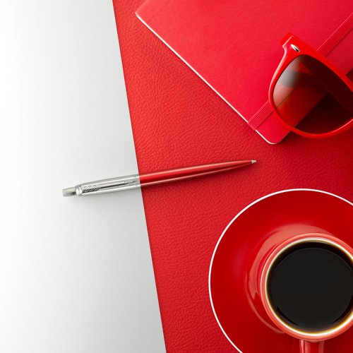 Slow down and appreciate the experience of expressing your thoughts and ideas on paper with the PARKER Jotter Kensington Red ballpoint pen. A style icon for over 60 years, the Jotter has a fresh, streamlined design. It features a stainless steel barrel in a rich red finish, linished stainless steel cap, high-shine trims, and an arrowhead clip. The Jotterâ€™s stunning details make it a refined gift for graduates, first-time job seekers, or anyone who appreciates the art of fine writing. This Jotter pen's name is inspired by the city of London. It arrives packaged in an elegant gift box.