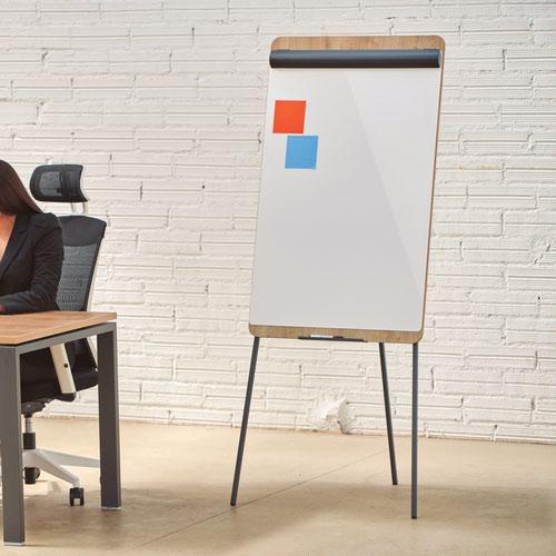 24499RC | NATURAL Range from Rocada is inspired by nature. Years of experience offer simplicity and balanced design to reflect our roots.Tripod flipchart offers sturdy support for your meetings and presentations. Strong metal legs can be adjusted for the each user and folded away for easy storage. Hardwearing surface also acts as a magnetic dry whiteboard, made from steel for longevity. Wooden back construction adds to its aesthetic appeal and would suit the most design oriented environment.
