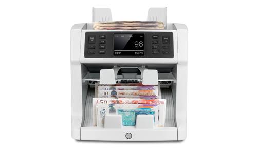 The Safescan 2985-SX is your ultimate tool for easy and effective counting, validating and sorting of banknotes, offering professional-grade mixed-note counting and counterfeit detection. A large touch screen with quick menu, numeric keyboard and individual presets ensures fast operation.Featuring a dual-pocket design and dual CIS technology, it will value-count even the most advanced currencies, such as those printed on polymer, those that have transparent windows and those whose denominations have nearly identical dimensions. Designed for high-volume use, the 2985-SX is ideal for businesses that need fast, error-free counting for multiple currencies and proven 100% accurate banknote authentication.The quick menu is a helpful tool that offers several features like batch presets and saving often used counting settings for dual operators, printing and a verify function. The quick menu is easily accessible via the large 3.2” TFT colour touch screen.Save time and eliminate all chance of error. The 2985-SX’s spacious hopper can hold 500 banknotes, and with an adjustable counting speed of up to 1.200 banknotes per minute, it provides you with maximum counting flexibility, reliability and efficiency.The 2985-SX’s front-loading hopper makes it possible for you to keep adding banknotes while it runs, for continuous counting—ideal in environments where time and accuracy are of the utmost importance.The 2985-SX is equipped with an additional stacker, known as the reject pocket, where it automatically places all unrecognized or suspicious banknotes. After counting, you can view a detailed report to see the reason why a particular banknote was rejected. The reject pocket is also used in the FACE and ORIENT modes to rapidly align a random stack of banknotes all in the same direction.The Safescan 2985-SX uses the latest counterfeit detection technology to scrutinize seven advanced security features built into today’s currencies: ultraviolet, magnetic ink, metallic thread, infrared, image, size and thickness. This technology is so reliable it will detect double banknotes and half notes. You’ll know with 100% certainty whether each banknote is genuine or counterfeit. The 2985-SX is programmed to automatically identify and fully authenticate banknotes in all available currencies. It will count all other currencies in counting mode ALL.Save time with this convenient feature; no need to scroll through all the currencies. The 2985-SX recognizes instantly the currency of the first loaded banknote.Counts unsorted banknotes for: GBP, EUR, USD, CHF, PLN, BGN, CZK, HUF, HRK, RON, TRY, SEK, NOK, DKK100% tested for Euro and GBPIncluded in the box:Safescan 2985-SX, Power cable, Cleaning and service kit, Dust cover, Warranty card, Quick installation guide