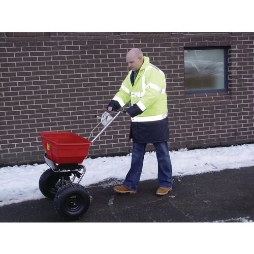 WE23476 | This salt spreader allows you to easily clear large areas of snow or ice, ensuring that pathways, roads and car parks are suitable for safe use. Featuring pneumatic tyres and an adjustable, 3-speed gear box, this salt spreader is rugged and can be used in the very worst weather without problems. Supplied with a rain cover, hopper screen and a capacity of 57kg, your salt remains dry and easy to disseminate over a large area.