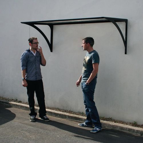 Wall mounted smoking/vaping canopy