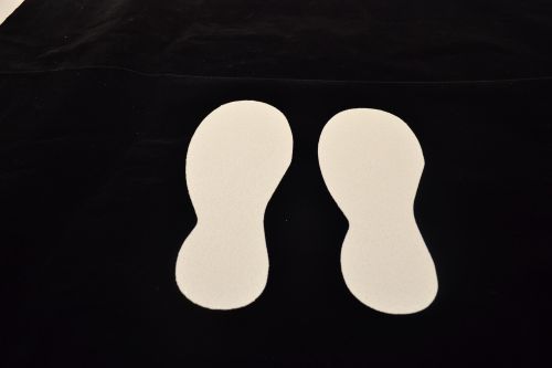 Photoluminescent Anti-Slip Floor Marking - Foot Shape with a strong adhesive backing and a tough anti-slip laminated face. Size 90 x 240mm.