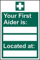 Your First Aider Is: _____ Located At: _____ sign (200 x 300mm). Manufactured from strong rigid PVC and is non-adhesive; 0.8mm thick.