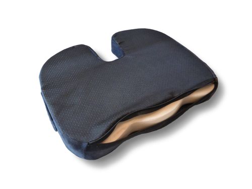 ST400001 | The WFH Cushion is a contoured memory foam posture cushion with coccyx cut-out, stretch velour cover and non-slip base. It is washable and of high quality. It has been designed and dimensioned to improve posture for most users. Improves comfort when used on dining chairs, folding-away chairs, kitchen stools, office chairs, wheelchairs and car seats.