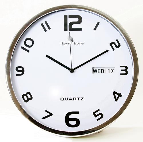 24562SS | Quartz wall clock with modern 12 hour number design and calendar day/date display. Hour, minute and second hands.