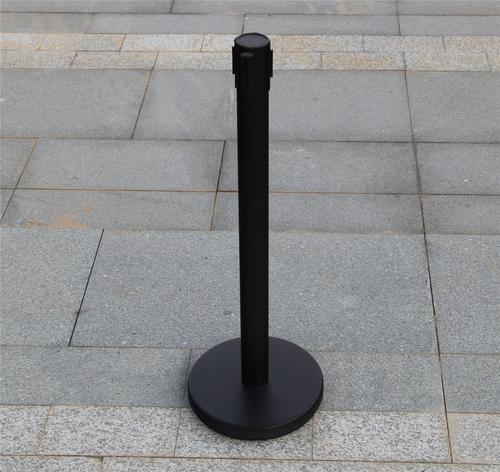 24954SS | Retractable Crowd Control Barrier Posts - high quality black retractable post stand with 2m red tape.With built in tape systems which extend to 2 metres, our post systems are great value for your business.The posts are 1 metre tall, and have anti-slip bases, but are heavy duty units.Each post has a 2 metre red retractable webbing, which can be connected four ways to each post. It’s ideal for enclosing sections or areas off.