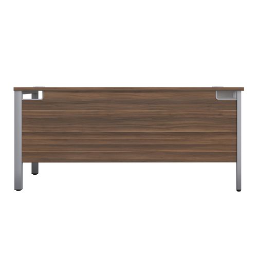 GP1680LHRETDWSV | The Goal Post Left Hand Return Desk is the perfect addition to any modern office space. With its ultra-modern goalpost leg design and modesty panel, this return style desk is both stylish and functional. The secure and sturdy frame ensures long-lasting use, while the durable and well-joined tops provide a timeless finish. The 25mm top thickness adds to the desk's durability and strength. This desk is perfect for those who want a sleek and modern look in their workspace, without sacrificing functionality or durability. Invest in the Goal Post Left Hand Return Desk for a stylish and practical addition to your office.