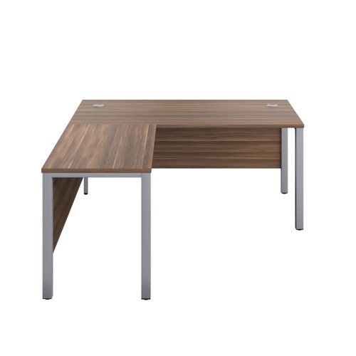 The Goal Post Left Hand Return Desk is the perfect addition to any modern office space. With its ultra-modern goalpost leg design and modesty panel, this return style desk is both stylish and functional. The secure and sturdy frame ensures long-lasting use, while the durable and well-joined tops provide a timeless finish. The 25mm top thickness adds to the desk's durability and strength. This desk is perfect for those who want a sleek and modern look in their workspace, without sacrificing functionality or durability. Invest in the Goal Post Left Hand Return Desk for a stylish and practical addition to your office.