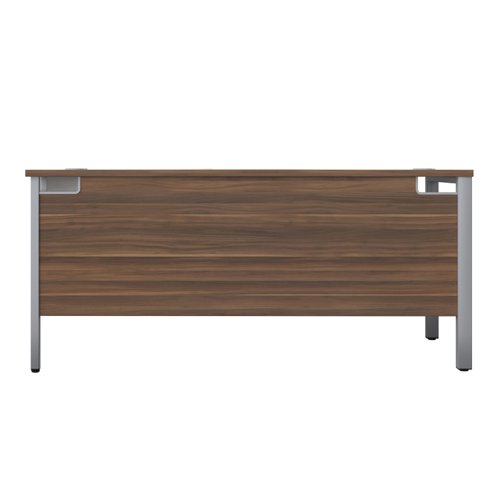 The Goal Post Right Hand Return Desk is the perfect addition to any modern office space. With its ultra-modern goalpost leg design and modesty panel, this return style desk is both stylish and functional. The secure and sturdy frame ensures long-lasting use, while the durable and well-joined tops provide a timeless finish. The 25mm top thickness adds to the desk's durability and strength. This desk is perfect for those who want a sleek and modern workspace that is both functional and stylish. Whether you're working from home or in the office, the Goal Post Right Hand Return Desk is the perfect choice for anyone who wants a desk that is both secure and stylish.