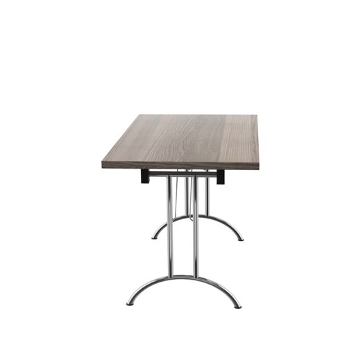 OUFT1270SVGO | The One Union Rectangular Folding Table is the perfect solution for anyone who needs a versatile table that can be easily moved and adjusted to fit their needs. This rectangular shaped tilting table features manual adjustment thumb wheels that allow you to tilt the top to the perfect angle for your needs. The table is also mobile, making it easy to move around any space. When not in use, it can be nested away for space-saving convenience. This makes it ideal for multi-functional rooms where space is at a premium. Additionally, the table has sturdy, secure feet that provide stability and support during use. Whether you need a table for work, play, or anything in between, the One Union Rectangular Folding Table is the perfect choice.