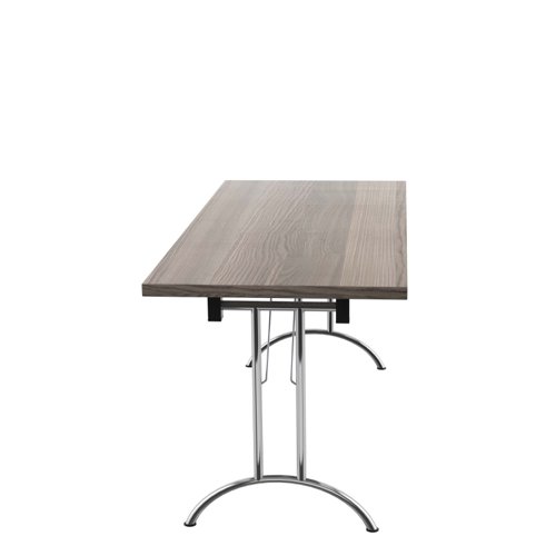 OUFT1670SVGO | The One Union Rectangular Folding Table is the perfect solution for anyone who needs a versatile table that can be easily moved and adjusted to fit their needs. This rectangular shaped tilting table features manual adjustment thumb wheels that allow you to tilt the top to the perfect angle for your needs. The table is also mobile, making it easy to move around any space. When not in use, it can be nested away for space-saving convenience. This makes it ideal for multi-functional rooms where space is at a premium. Additionally, the table has sturdy, secure feet that provide stability and support during use. Whether you need a table for work, play, or anything in between, the One Union Rectangular Folding Table is the perfect choice.