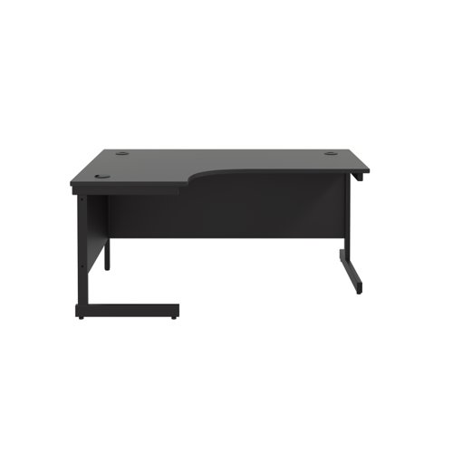 SU1812LHRADBKBK | The Single Upright Left Hand Radial Desk is the perfect addition to any modern office space. With its sleek and stylish design, this desk features a cantilever leg and is available in white, black, and silver legs to match any decor. The desk also comes with cable ports as a standard feature, making it easy to keep your workspace organised and clutter-free. Additionally, the adjustable feet allow for easy levelling on uneven floors, while the included modesty panels provide added privacy and a professional look. Whether you're working from home or in a busy office, this desk is sure to provide the functionality and style you need to stay productive and comfortable all day long.