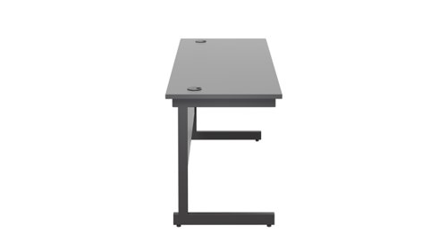SU1860RECBKBK | The Single Upright Rectangular Desk, with its sleek and stylish design, this Modern cantilever leg rectangular office desk is available in white, black and silver legs to suit any decor. The desk comes with cable ports supplied as a standard, making it easy to keep your workspace tidy and organised. The adjustable feet ensure that the desk is level on uneven floors, while the included modesty panels provide privacy and a professional look. Whether you're working from home or in the office, our Single Upright Rectangular Desk is the ideal choice for a comfortable and productive workspace.