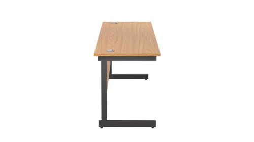 SU1860RECNOBK | The Single Upright Rectangular Desk, with its sleek and stylish design, this Modern cantilever leg rectangular office desk is available in white, black and silver legs to suit any decor. The desk comes with cable ports supplied as a standard, making it easy to keep your workspace tidy and organised. The adjustable feet ensure that the desk is level on uneven floors, while the included modesty panels provide privacy and a professional look. Whether you're working from home or in the office, our Single Upright Rectangular Desk is the ideal choice for a comfortable and productive workspace.