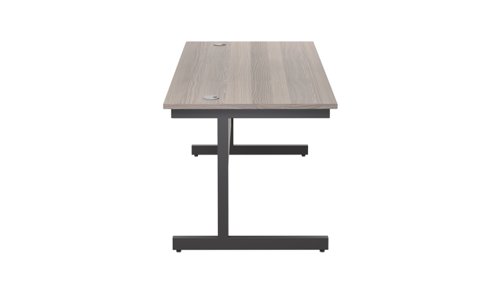 SU1880RECGOBK | The Single Upright Rectangular Desk, with its sleek and stylish design, this Modern cantilever leg rectangular office desk is available in white, black and silver legs to suit any decor. The desk comes with cable ports supplied as a standard, making it easy to keep your workspace tidy and organised. The adjustable feet ensure that the desk is level on uneven floors, while the included modesty panels provide privacy and a professional look. Whether you're working from home or in the office, our Single Upright Rectangular Desk is the ideal choice for a comfortable and productive workspace.