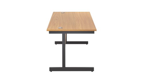 SU1880RECNOBK | The Single Upright Rectangular Desk, with its sleek and stylish design, this Modern cantilever leg rectangular office desk is available in white, black and silver legs to suit any decor. The desk comes with cable ports supplied as a standard, making it easy to keep your workspace tidy and organised. The adjustable feet ensure that the desk is level on uneven floors, while the included modesty panels provide privacy and a professional look. Whether you're working from home or in the office, our Single Upright Rectangular Desk is the ideal choice for a comfortable and productive workspace.