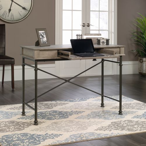 The Teknik Office Canal Heights Console Desk is our decorative and minimalist design option for any home office or study. This durable yet sleek looking desk provides a spacious platform for all manner of home study activities, as well as housing an easy glide drawer featuring full extension slides to stash away your stationery, keyboard or laptop. The drawer also benefits from a flip-down front for easy access. The sturdy powder-coated black metal rear crossbar frame coupled with the neutral coloured northern oak finish top ensure it's an ideal match for all rooms and colour schemes. It also has the added benefit of being finished on all sides for versatile placement within your home or office. There are also co-ordinating furniture items under the Canal Heights Range that will complement this Console desk.