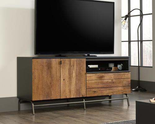Teknik Office Boulevard Cafe TV Credenza in a black finish with Vintage Oak accents accommodates up to 60â€ TV 2 adjustable shelves behind doors