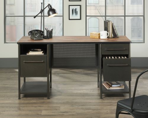 The Teknik Office Boulevard Cafe Desk is a sleek and tasteful option for all styles of office and colour schemes.  This fresh and modern styled desk benefits from a large desktop working surface finished in a stunning contrasting Vintage Oak Accent effect which not only provides more than ample space for writing and computer work, it is an ideal match for all decorative interiors. There are three storage drawers with full extension slides to stash all manner of desking stationery as well as two storage shelves and one cubbyhole finished in black. The lower drawers hold letter sized suspension files for additional organisation. The look is completed with a beautifully finished powder coated sturdy metal frame, accented with perforated metal panels. This desk also benefits from a 360 degree finish, for effortless and versatile placement anywhere within your home or office working area. 