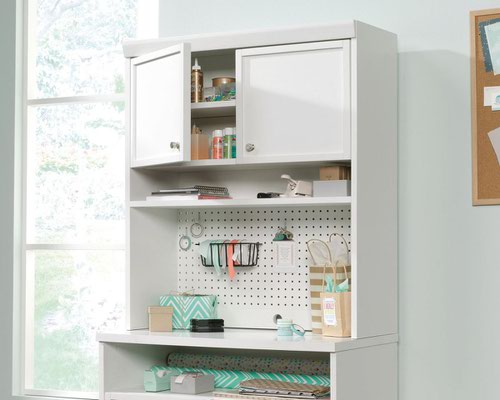 The Teknik Office Craft Storage Hutch in a White Finish is a delightfully simple and useful optional extra for our Craft Ranges 5421405 Craft Open Storage Cabinet, 5421407 Craft Storage Cabinet or the 5421417 Craft Desk/Table. It has an adjustable shelf behind doors for customisable storage of your favourite craft items. There is also an open shelf for easy access storage and a built in pegboard which provides convenient and visible organisation of tools and supplies. It also benefits from an enclosed back with cord access to allow a convenient path for all of your cables. 